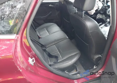 2014 Ford Focus Titanium z USA, uszkodzony, nr VIN 1FADP3J21EL309924